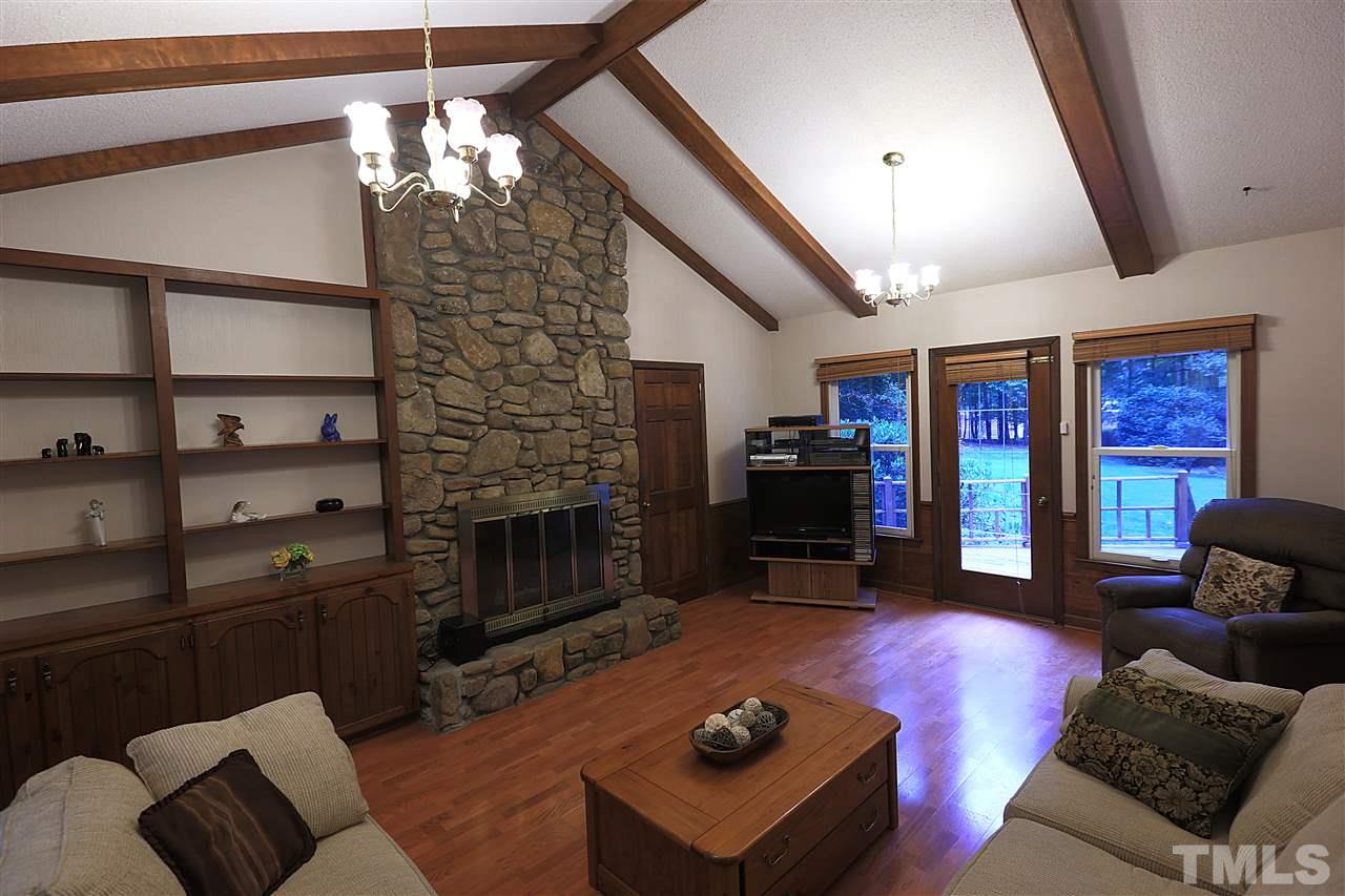 113 Trotters Ridge Drive Raleigh, NC 27614 - Photo 8 of 25 Nice Built-ins and Stone Wood Burning Fireplace!