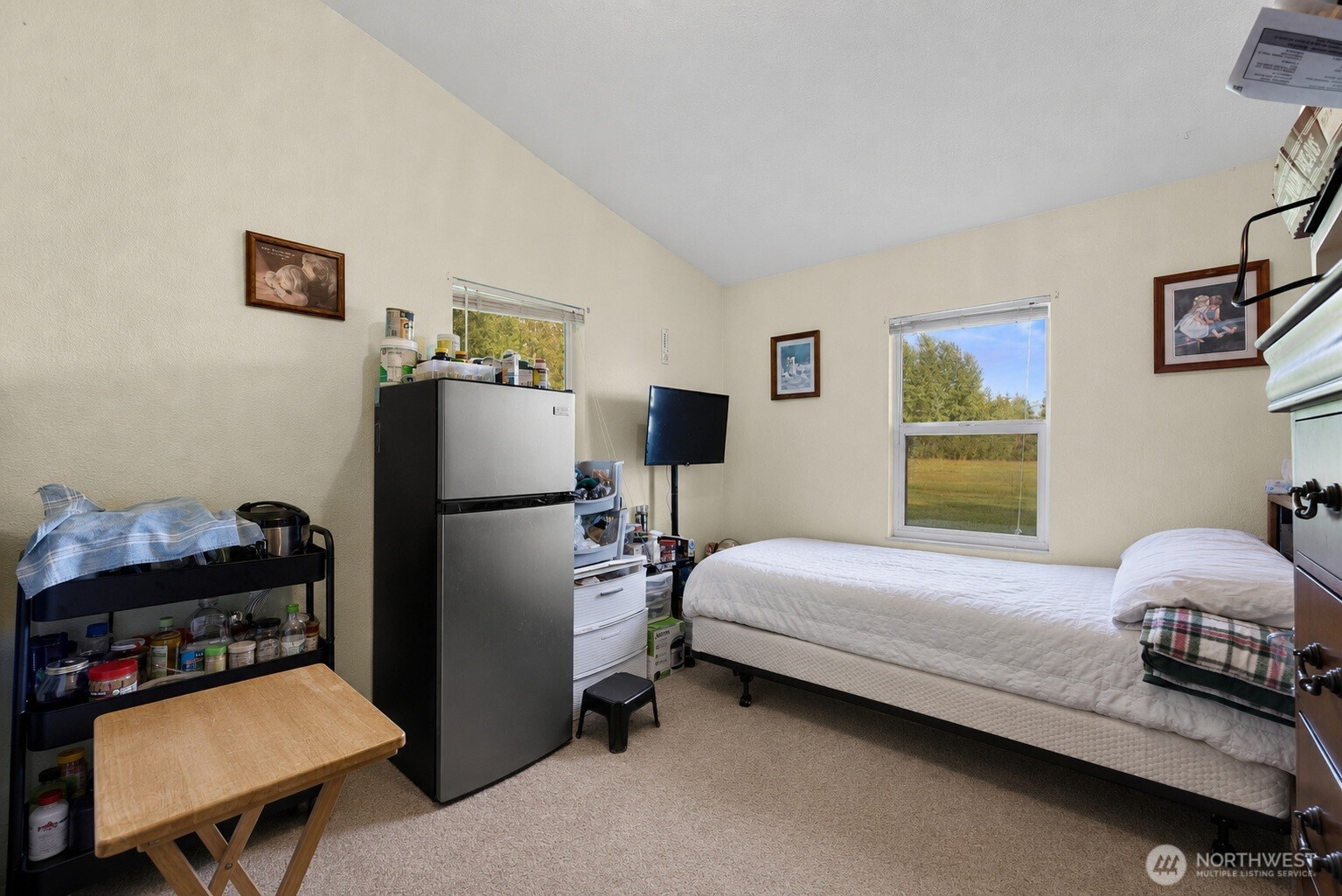 7928 Portal Way Custer, WA 98240 - Photo 8 of 39 a bedroom with a bed and a table in it