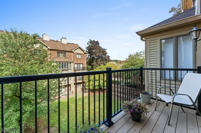 a view of a two chair in the balcony