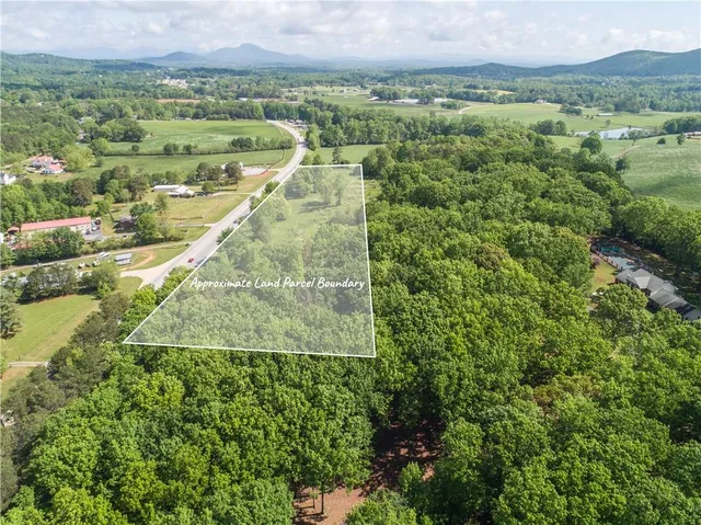 a view of a city with a lake