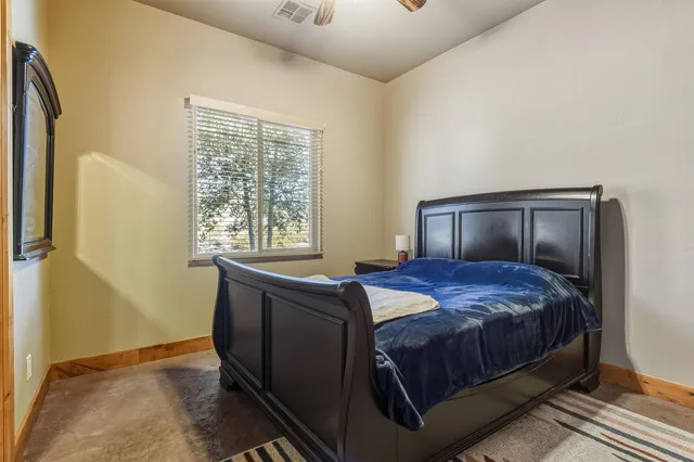 a bathroom with a bathtub a shower and a sink