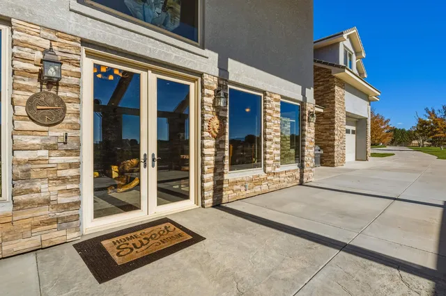 a front view of a building with a glass door