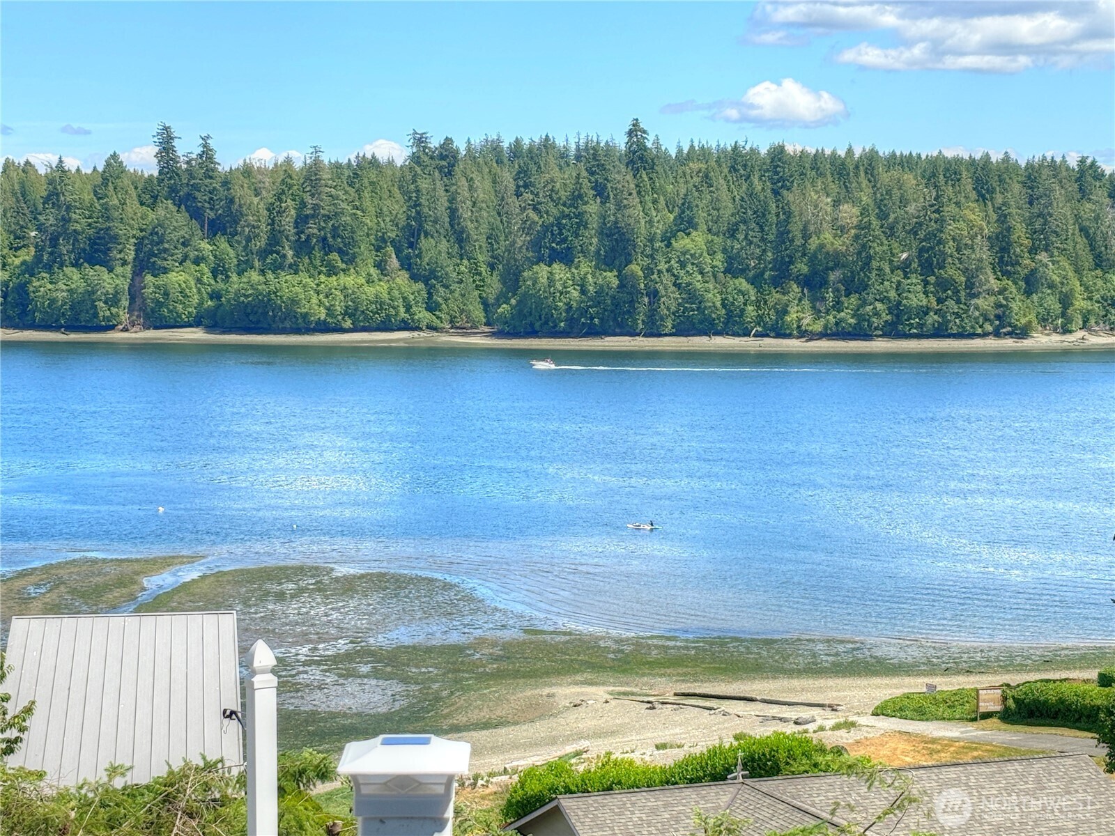 81 East Panorama Way Grapeview, WA 98546 - Photo 2 of 21 a view of a lake with a yard