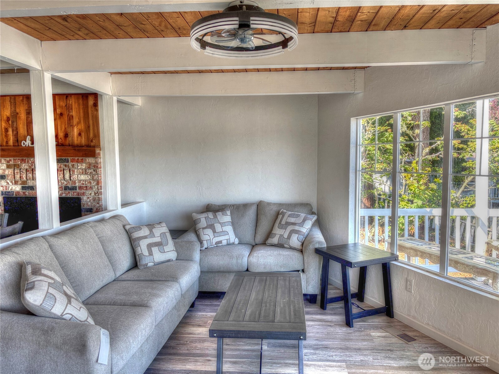 81 East Panorama Way Grapeview, WA 98546 - Photo 6 of 21 a living room with furniture and a large window