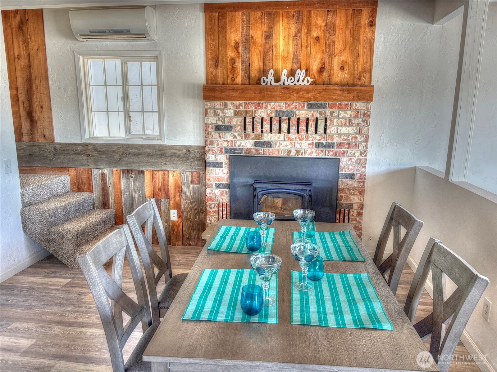 81 East Panorama Way Grapeview, WA 98546 - Photo 10 of 21 a living room with furniture fireplace and a window