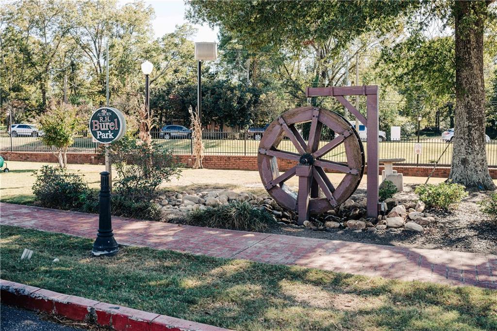 210 Wingate Drive Winder, GA 30680 - Photo 18 of 40 a view of a bench in a garden