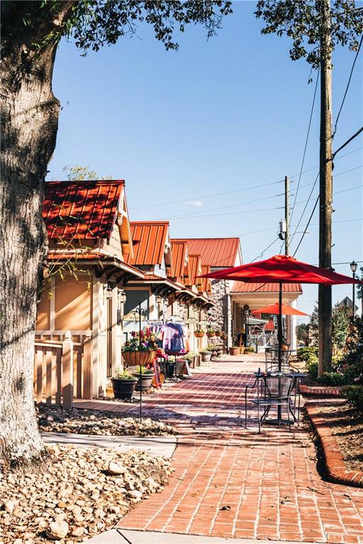 210 Wingate Drive Winder, GA 30680 - Photo 21 of 40 a view of a water fountain and a bench