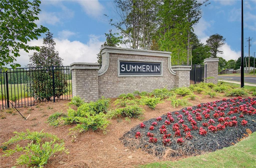 210 Wingate Drive Winder, GA 30680 - Photo 4 of 40 a view of a garden with flowers