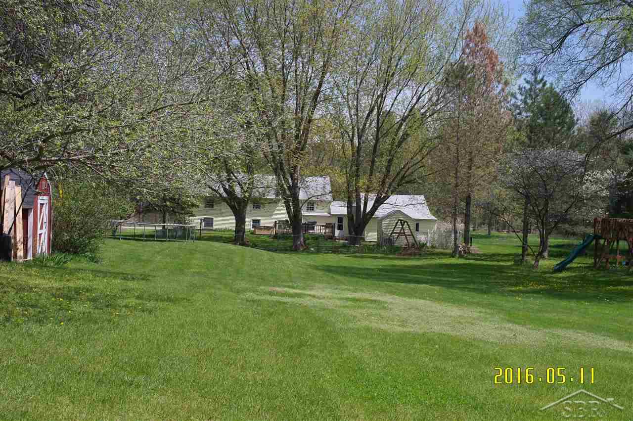 1007 Vance Road Midland, MI 48640 - Photo 3 of 21 From the back of the property. Lots of room to play.