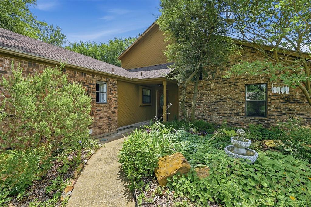 a backyard of a house with lots of green space