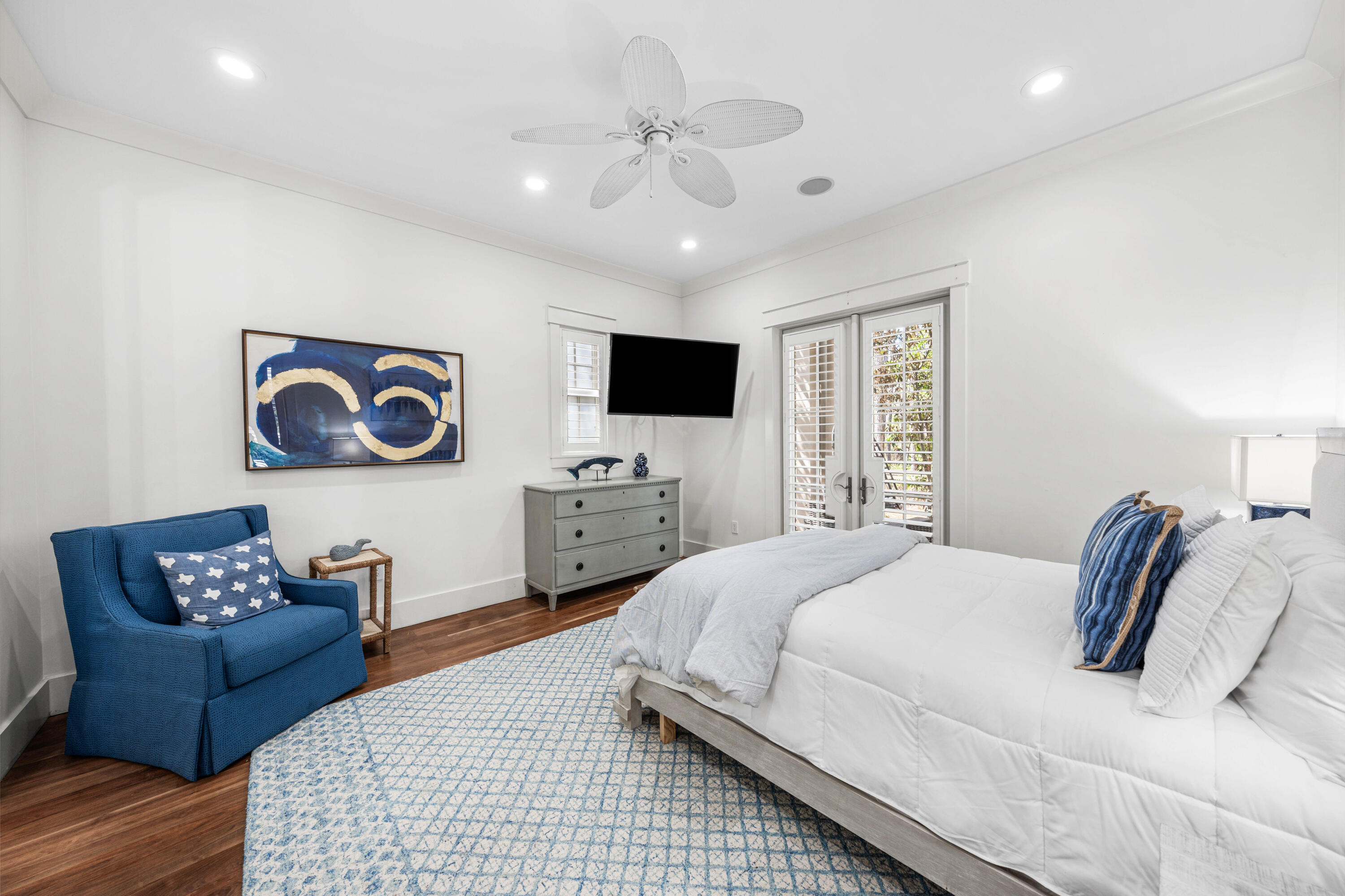 114 Pine Needle Way Santa Rosa Beach, FL 32459 - Photo 19 of 66 a bedroom with a bed couches and a flat screen tv