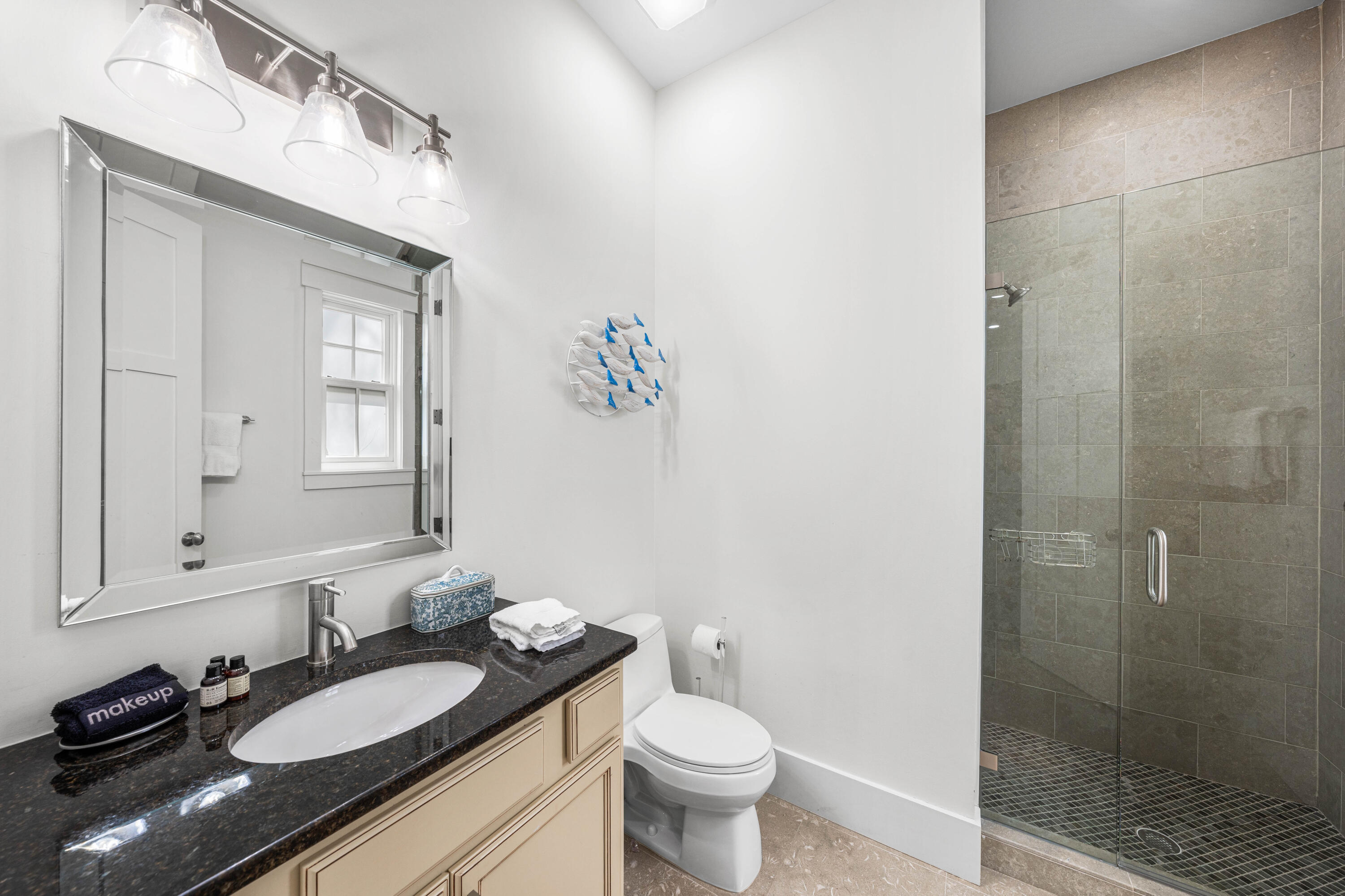 114 Pine Needle Way Santa Rosa Beach, FL 32459 - Photo 22 of 66 a bathroom with a granite countertop sink toilet and shower