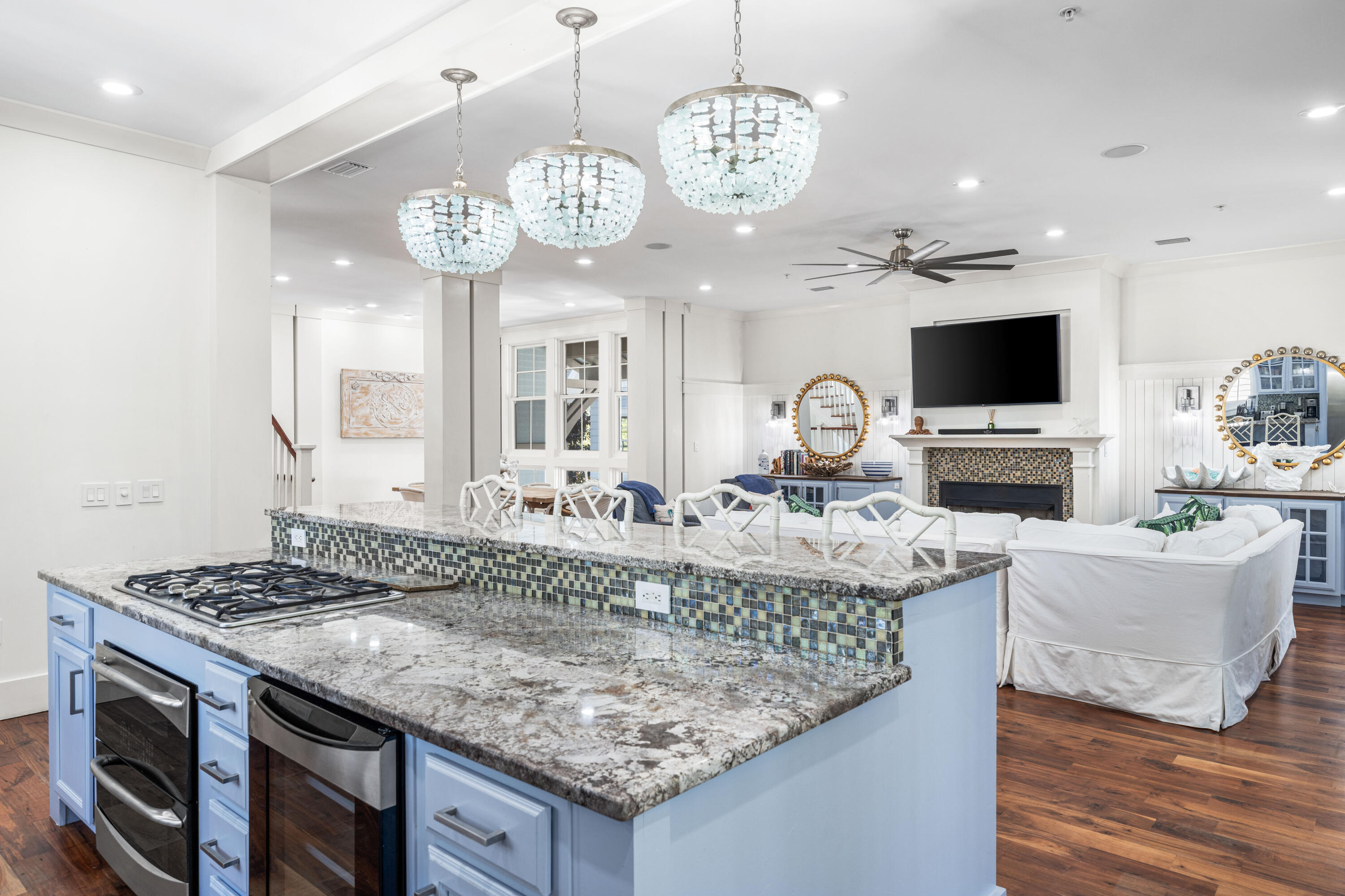 114 Pine Needle Way Santa Rosa Beach, FL 32459 - Photo 29 of 66 a view of living room kitchen with stainless steel appliances granite countertop furniture and fireplace