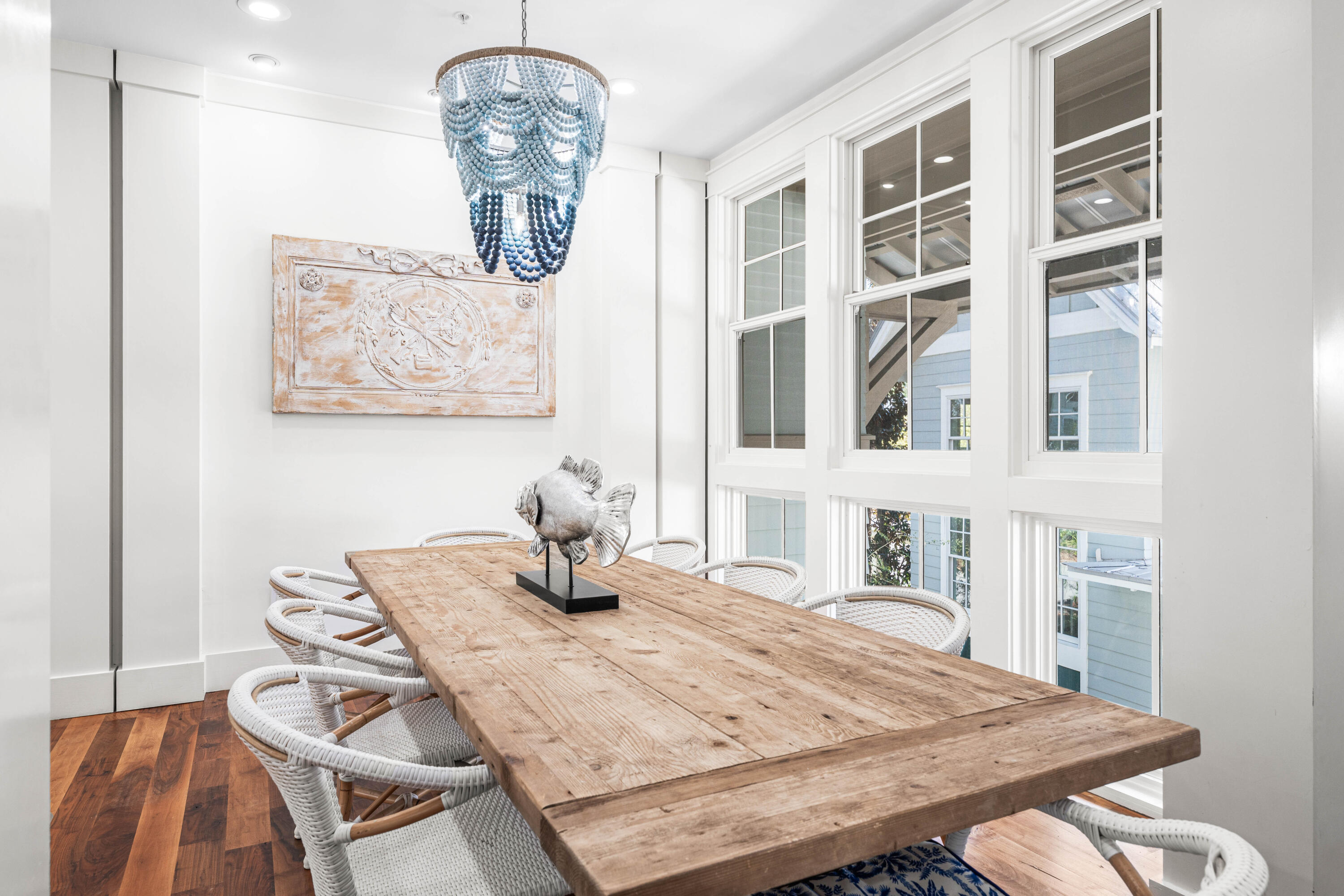 114 Pine Needle Way Santa Rosa Beach, FL 32459 - Photo 33 of 66 a dining room with a table and chairs