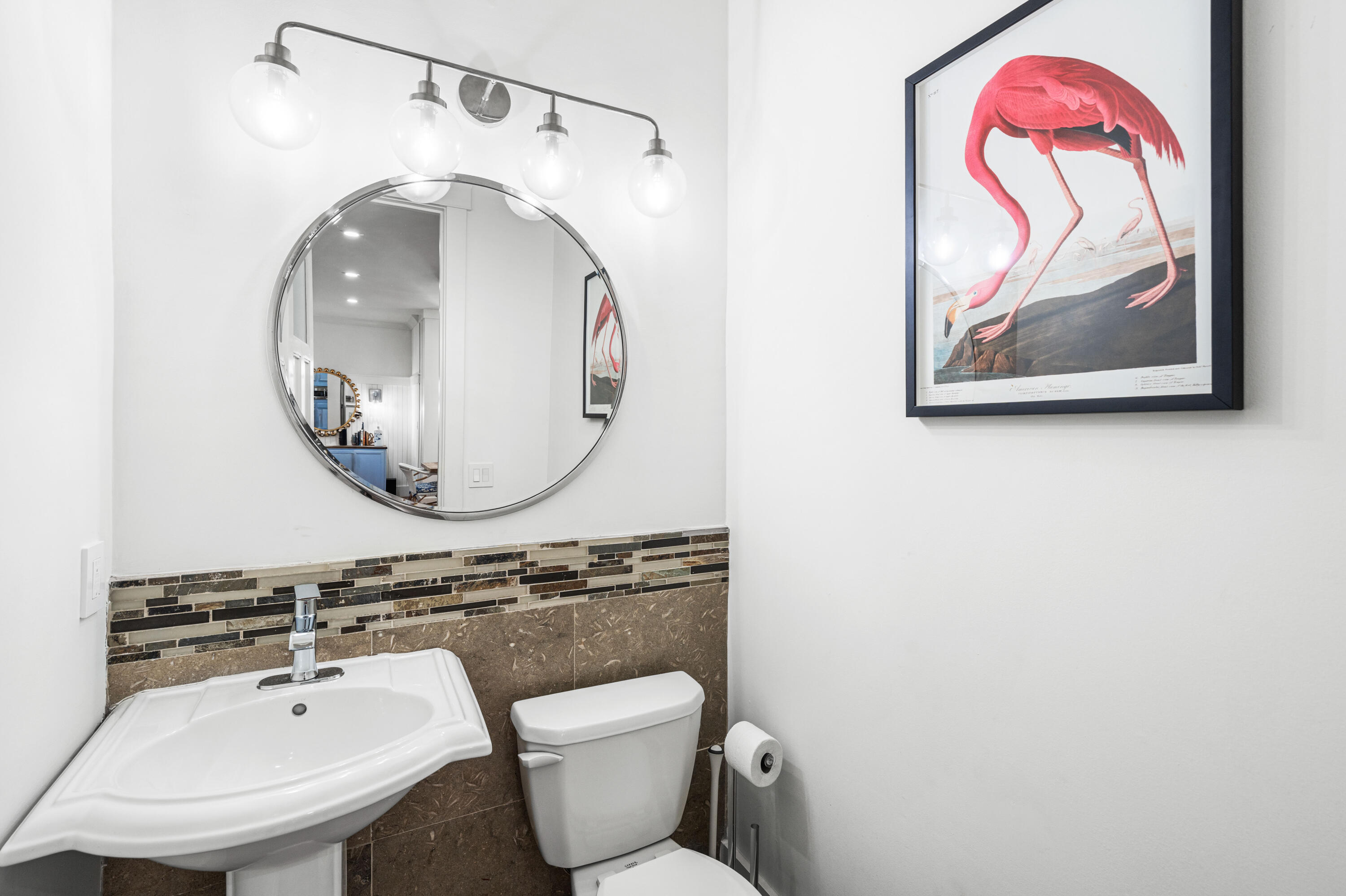 114 Pine Needle Way Santa Rosa Beach, FL 32459 - Photo 40 of 66 a bathroom with a toilet a sink and a mirror