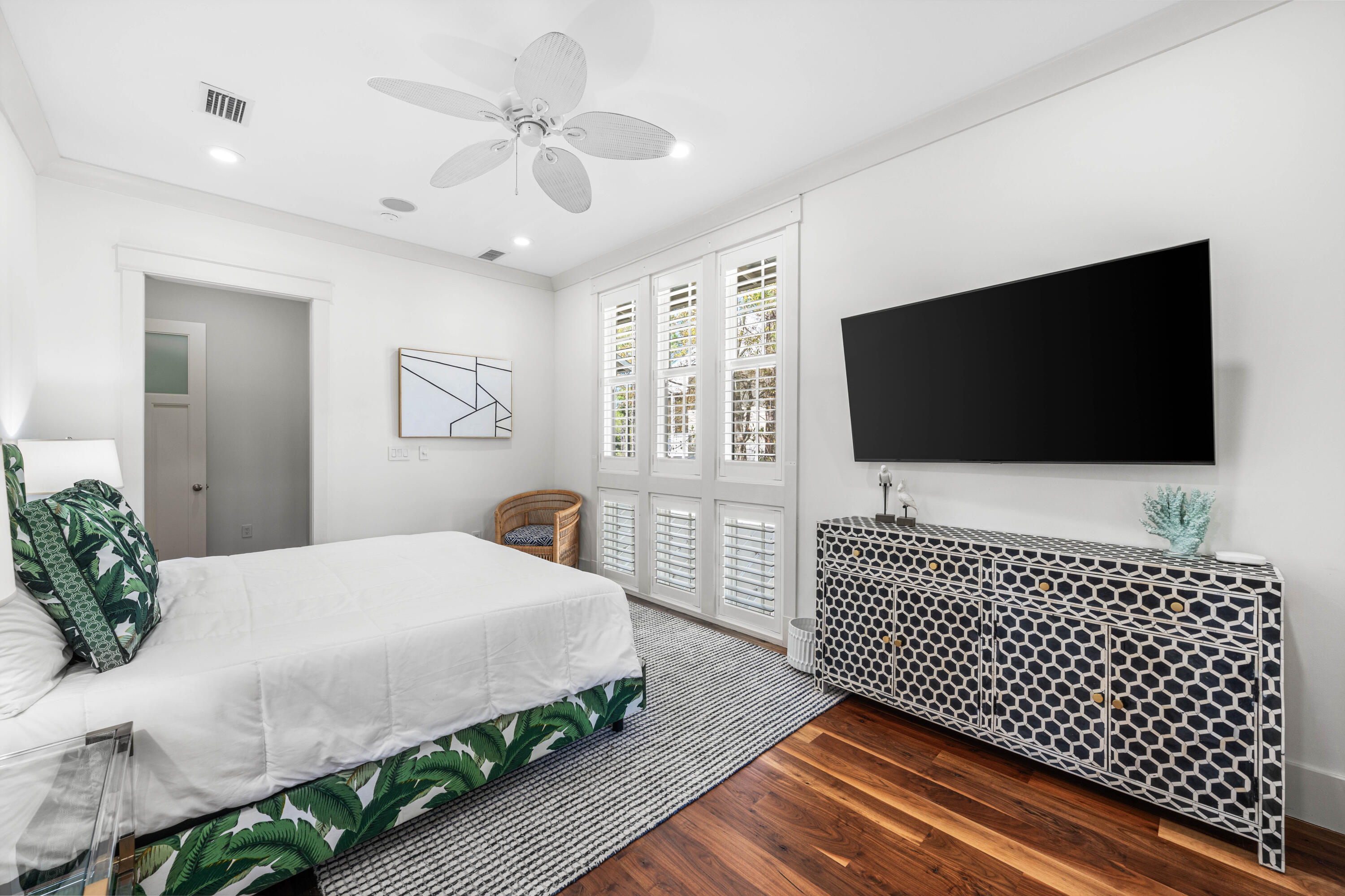 114 Pine Needle Way Santa Rosa Beach, FL 32459 - Photo 42 of 66 a bedroom with a bed and a flat screen tv