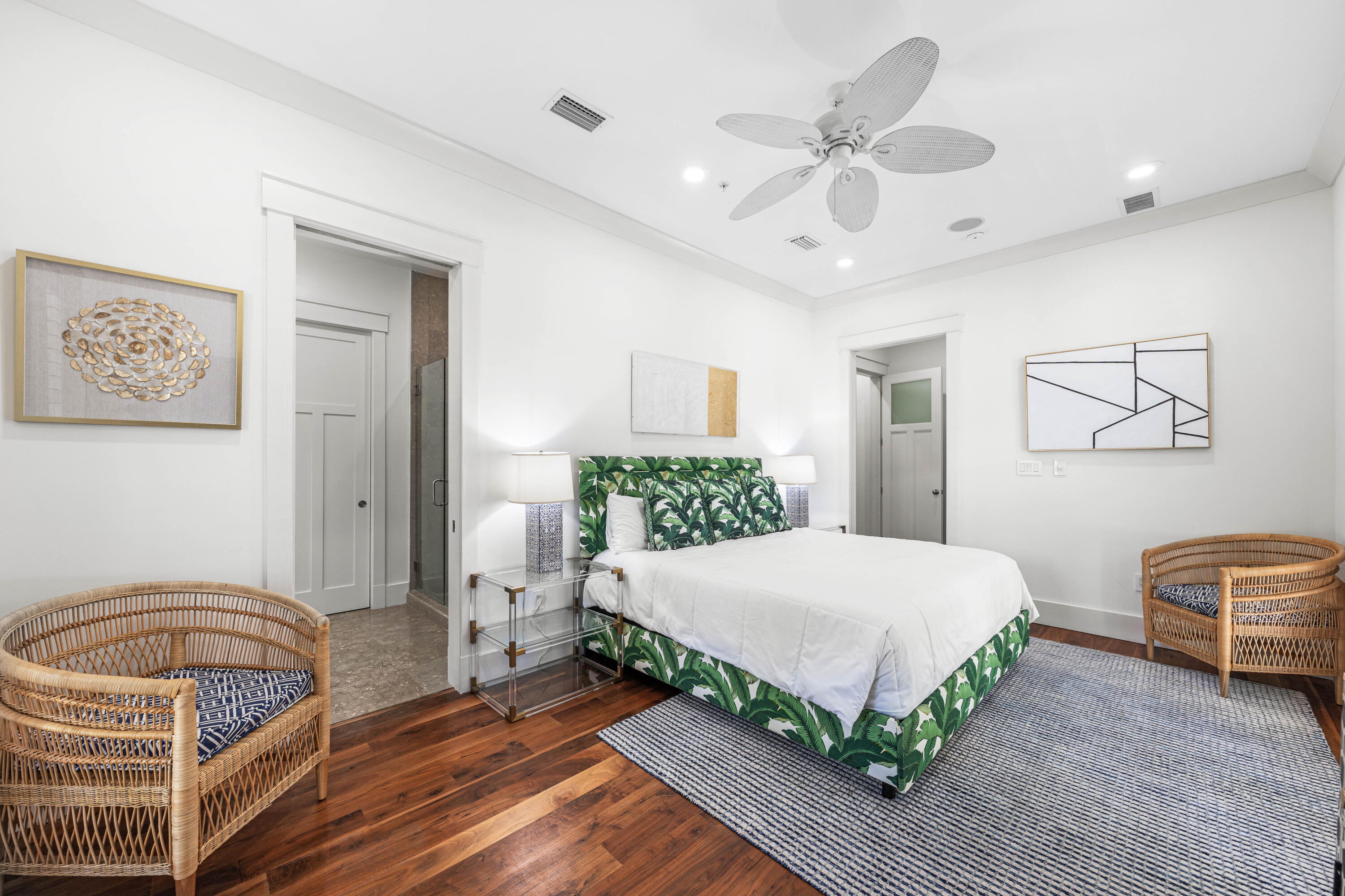 114 Pine Needle Way Santa Rosa Beach, FL 32459 - Photo 43 of 66 a bedroom with a bed lamp and a chandelier