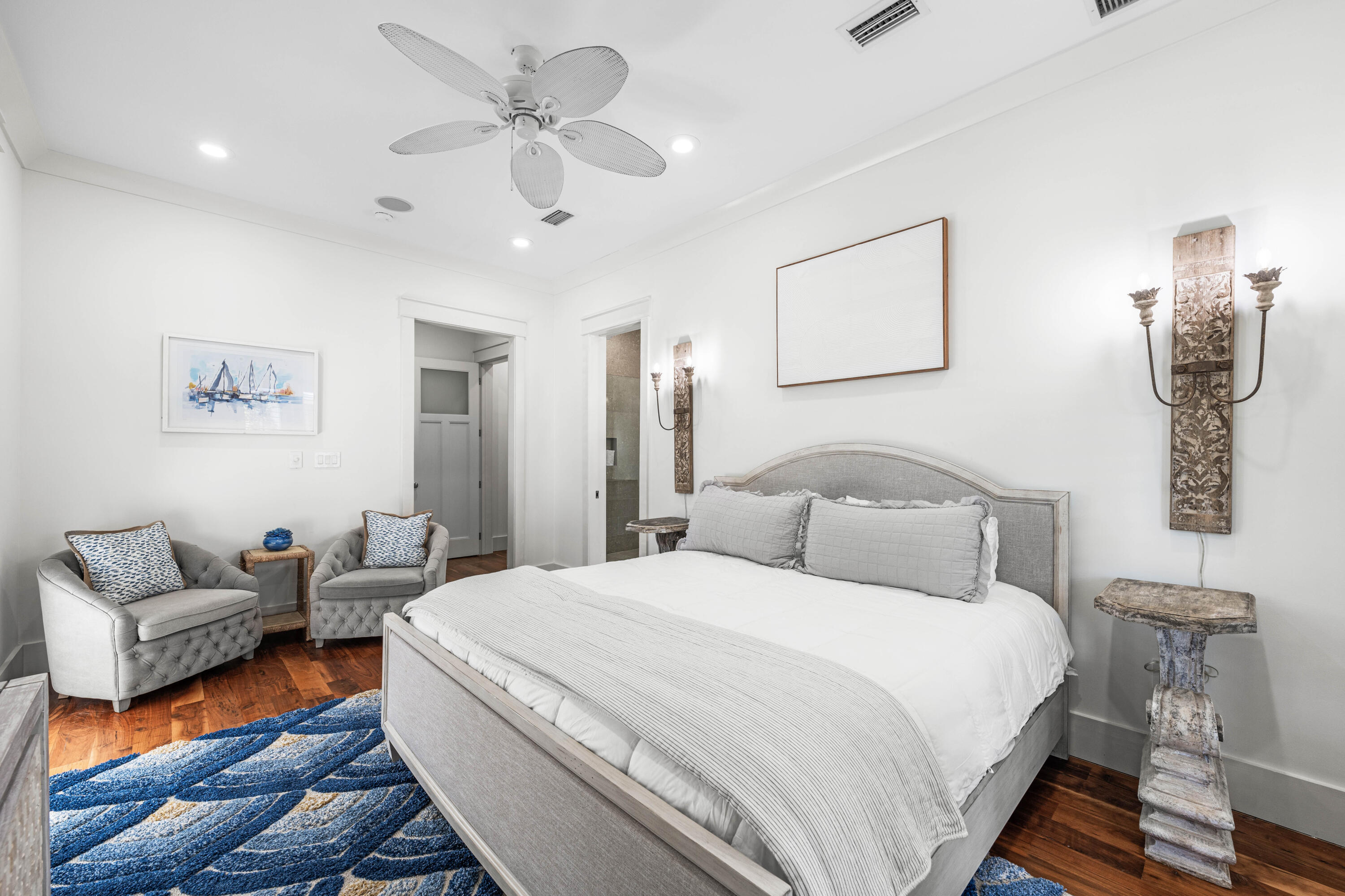 114 Pine Needle Way Santa Rosa Beach, FL 32459 - Photo 47 of 66 a bedroom with a bed and wooden floor