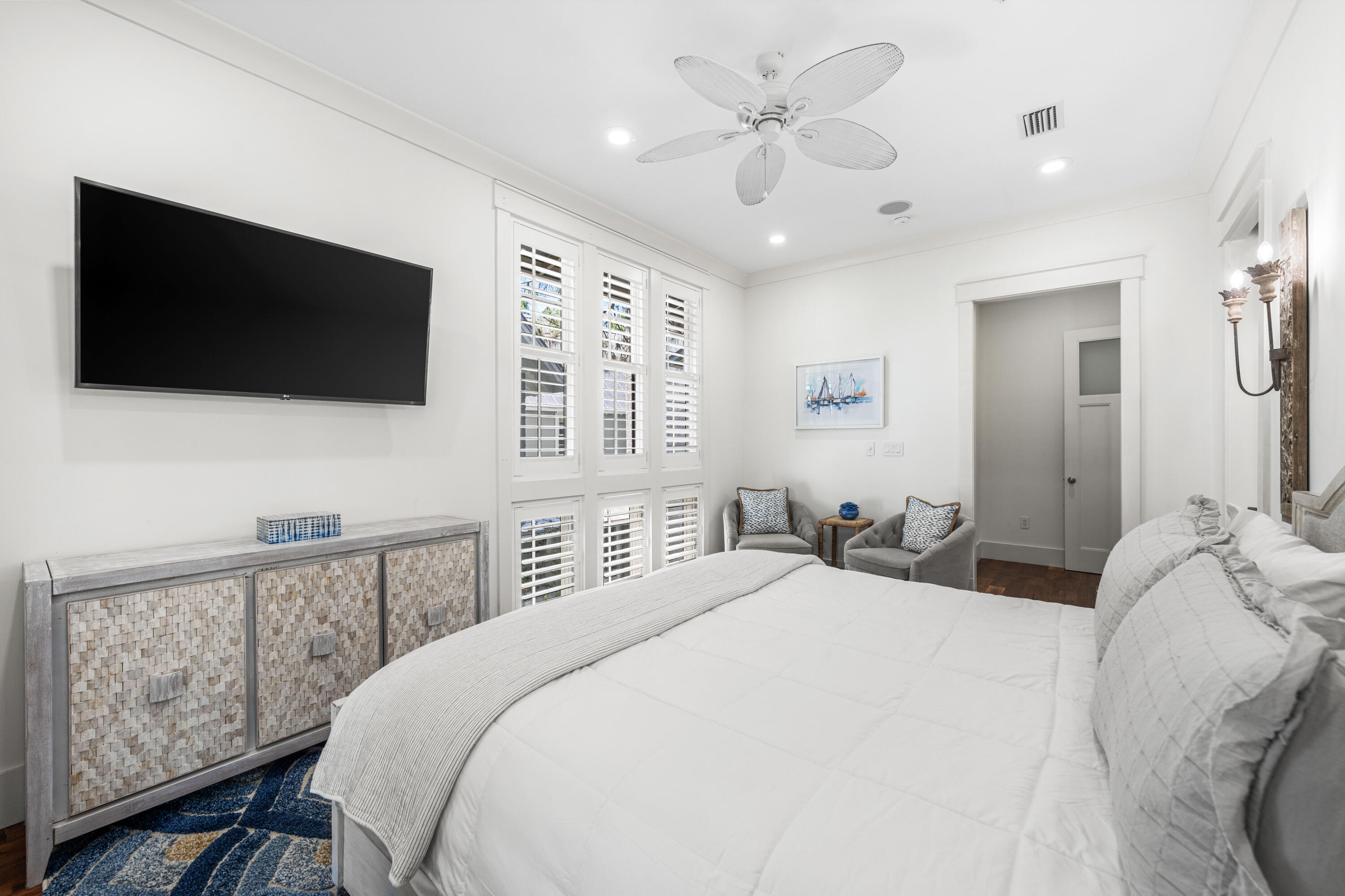 114 Pine Needle Way Santa Rosa Beach, FL 32459 - Photo 48 of 66 a bedroom with a large bed and a flat screen tv