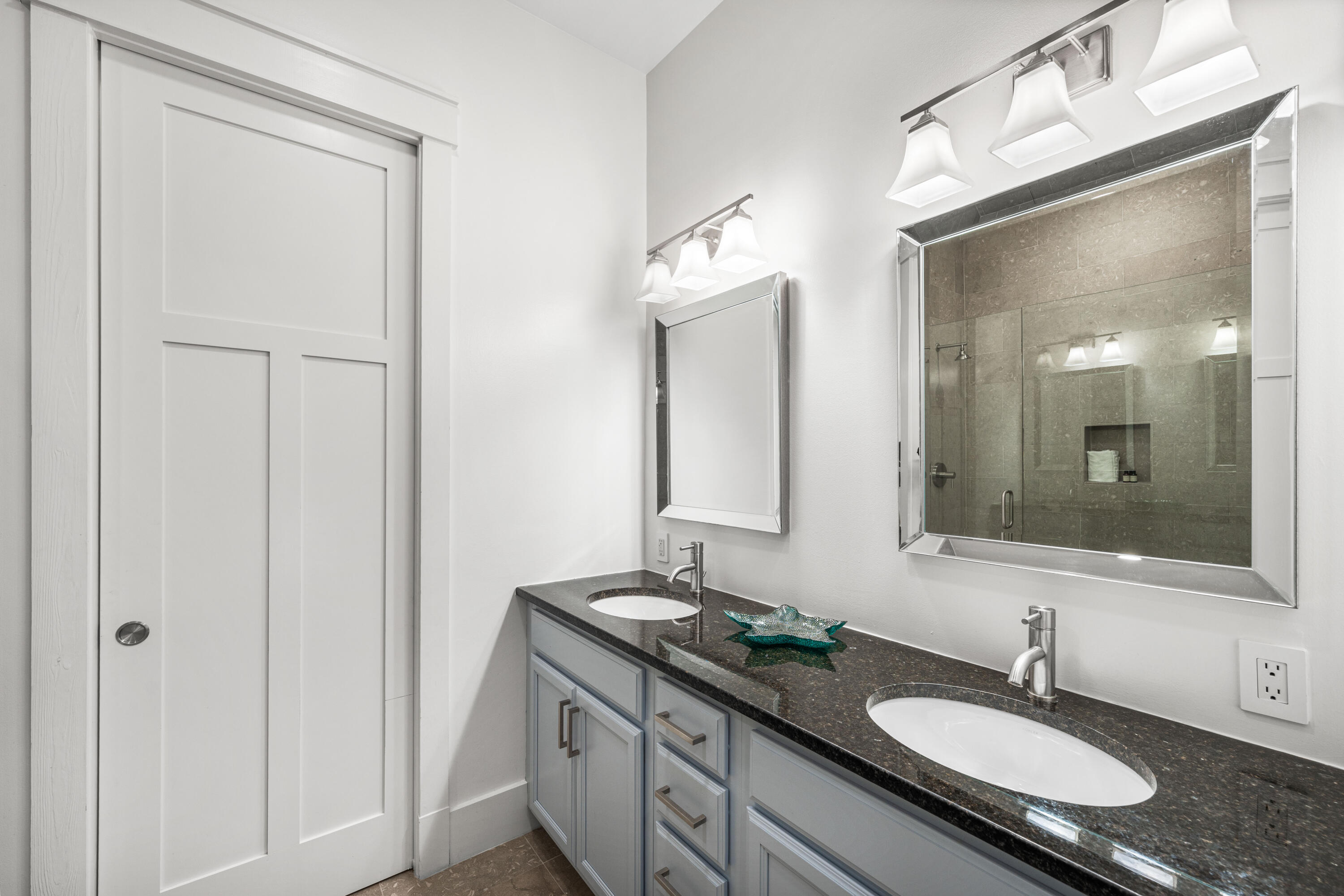 114 Pine Needle Way Santa Rosa Beach, FL 32459 - Photo 49 of 66 a bathroom with 2 sink and a mirror