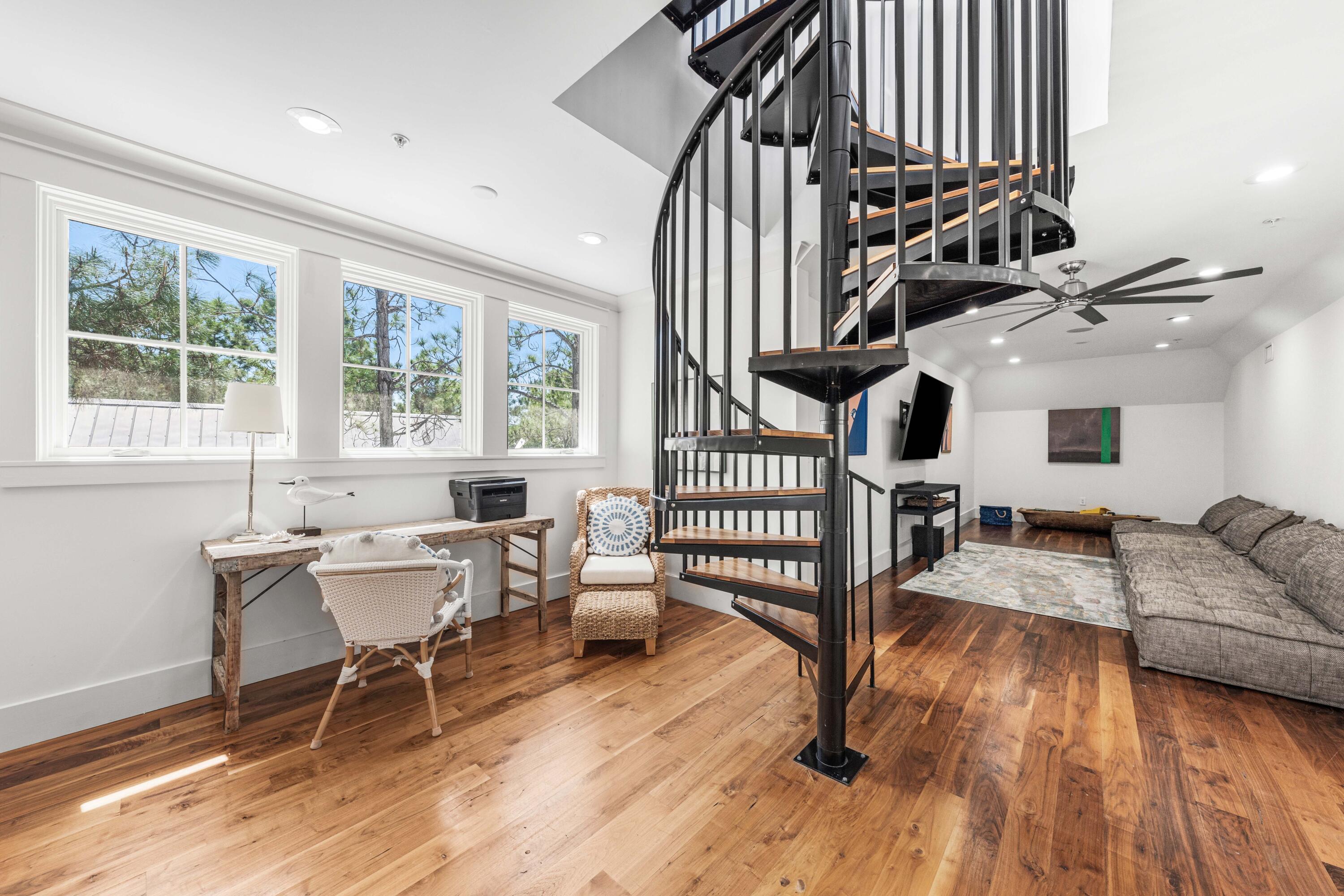 114 Pine Needle Way Santa Rosa Beach, FL 32459 - Photo 53 of 66 a view of a livingroom with furniture and staircase