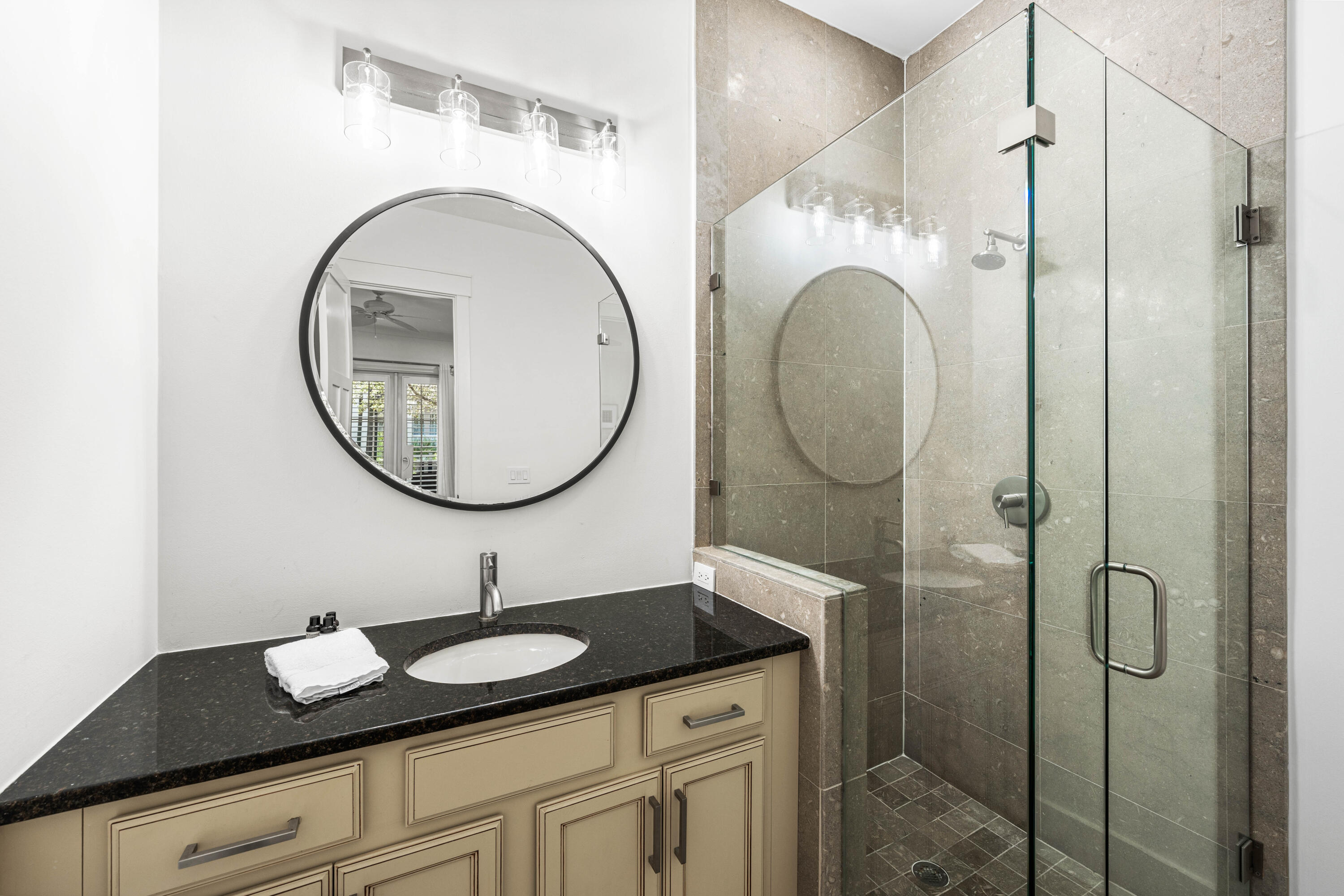 114 Pine Needle Way Santa Rosa Beach, FL 32459 - Photo 9 of 66 a bathroom with a granite countertop sink mirror and vanity