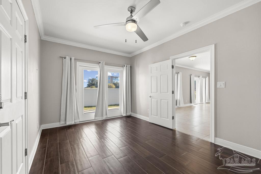 321 Gulfview Lane Perdido Key, FL 32507 - Photo 43 of 57 a view of an empty room with wooden floor