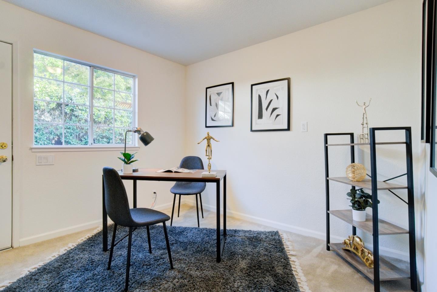 18444 Purdue Drive Saratoga, CA 95070 - Photo 21 of 31 a view of a livingroom with furniture and window