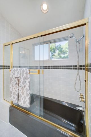 a view of a bath tub sitting in a room