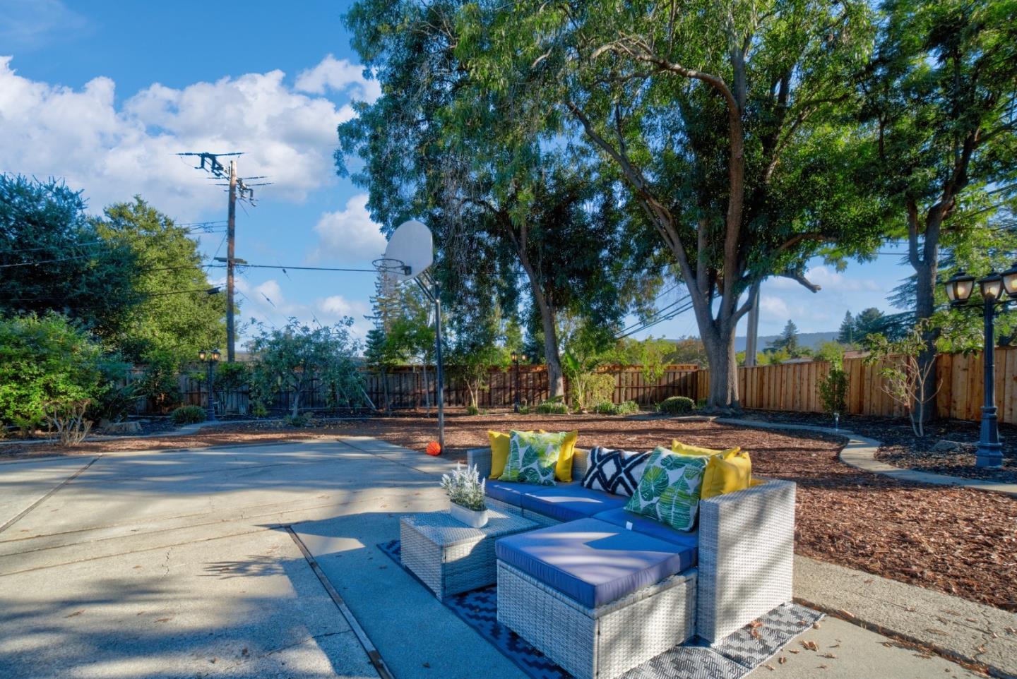 18444 Purdue Drive Saratoga, CA 95070 - Photo 28 of 31 a view of a swimming pool with a patio