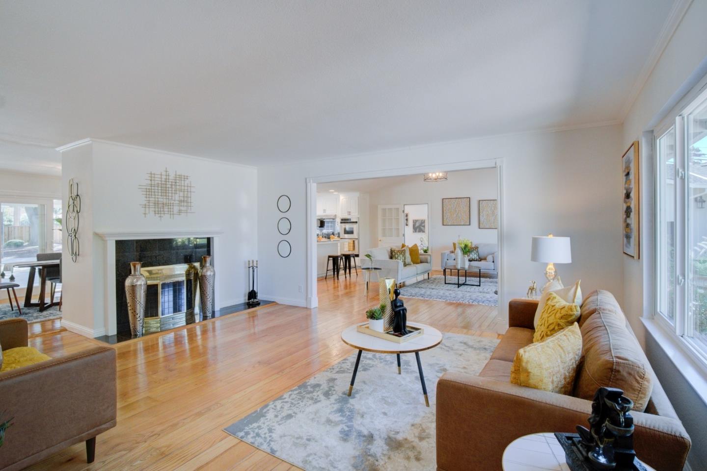 18444 Purdue Drive Saratoga, CA 95070 - Photo 4 of 31 a living room with fireplace furniture and a wooden floor