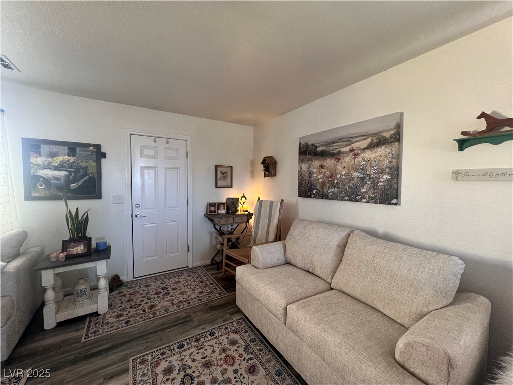 2970 Rio Rico Drive Pahrump, NV 89048 - Photo 13 of 53 Living area with wood finished floors