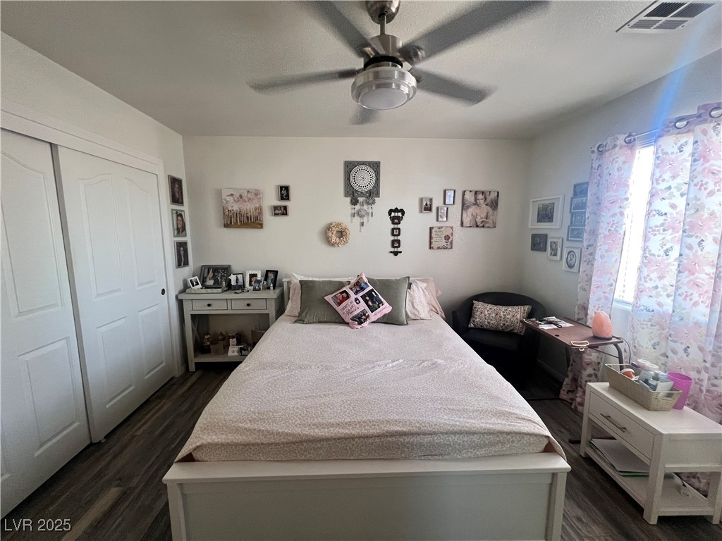 2970 Rio Rico Drive Pahrump, NV 89048 - Photo 26 of 53 Primary Bedroom featuring dark wood finished floors, a textured ceiling, and ceiling fan