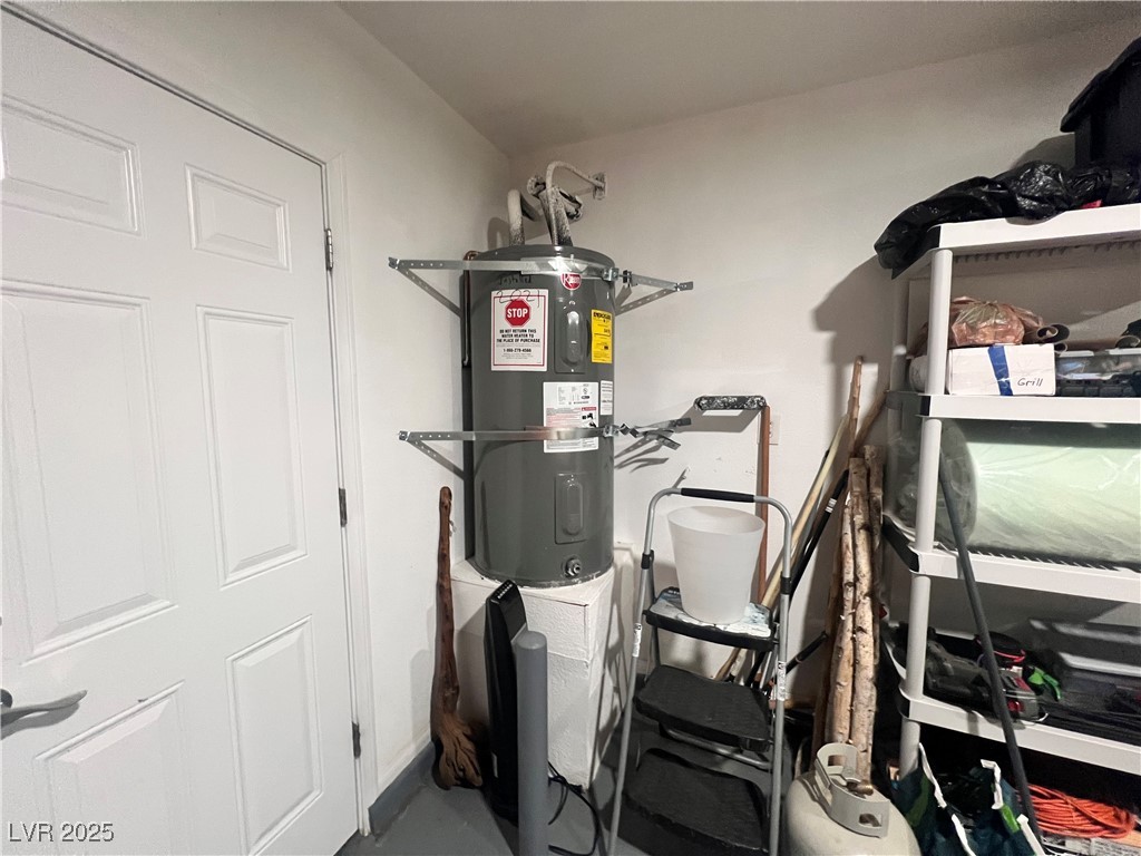 2970 Rio Rico Drive Pahrump, NV 89048 - Photo 51 of 53 Utility room featuring water heater