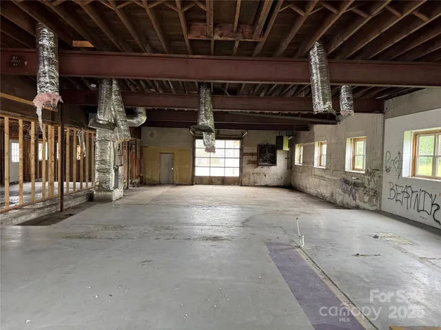 a view of a backyard of the house