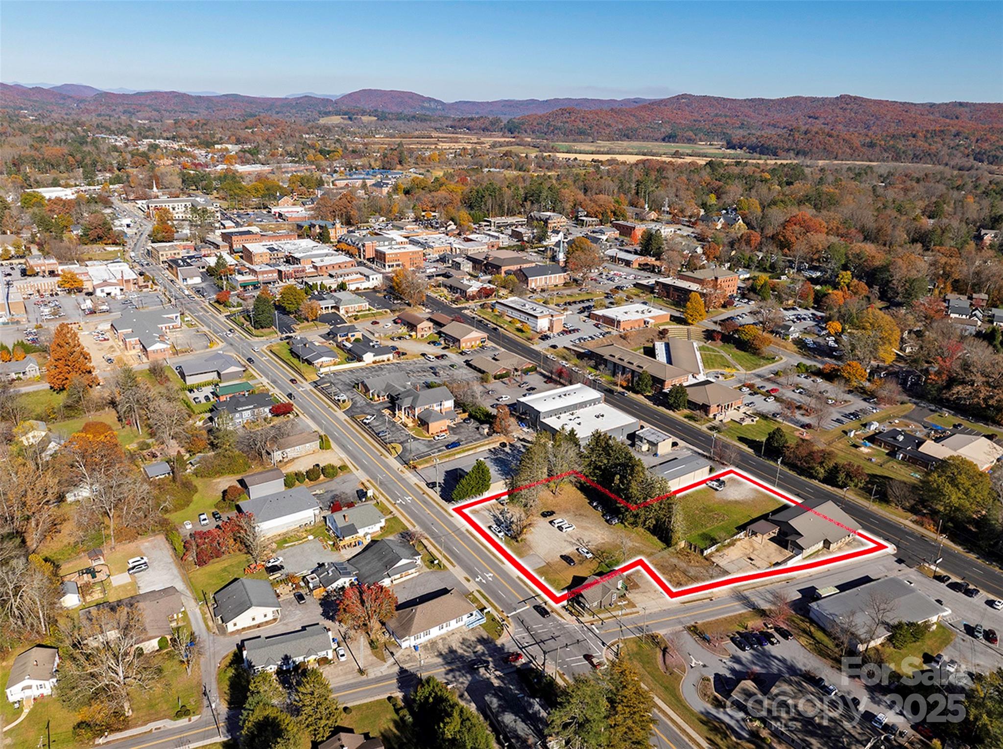 280 South Broad Street Brevard, NC 28712 - Photo 4 of 20 an aerial view of residential houses with outdoor space