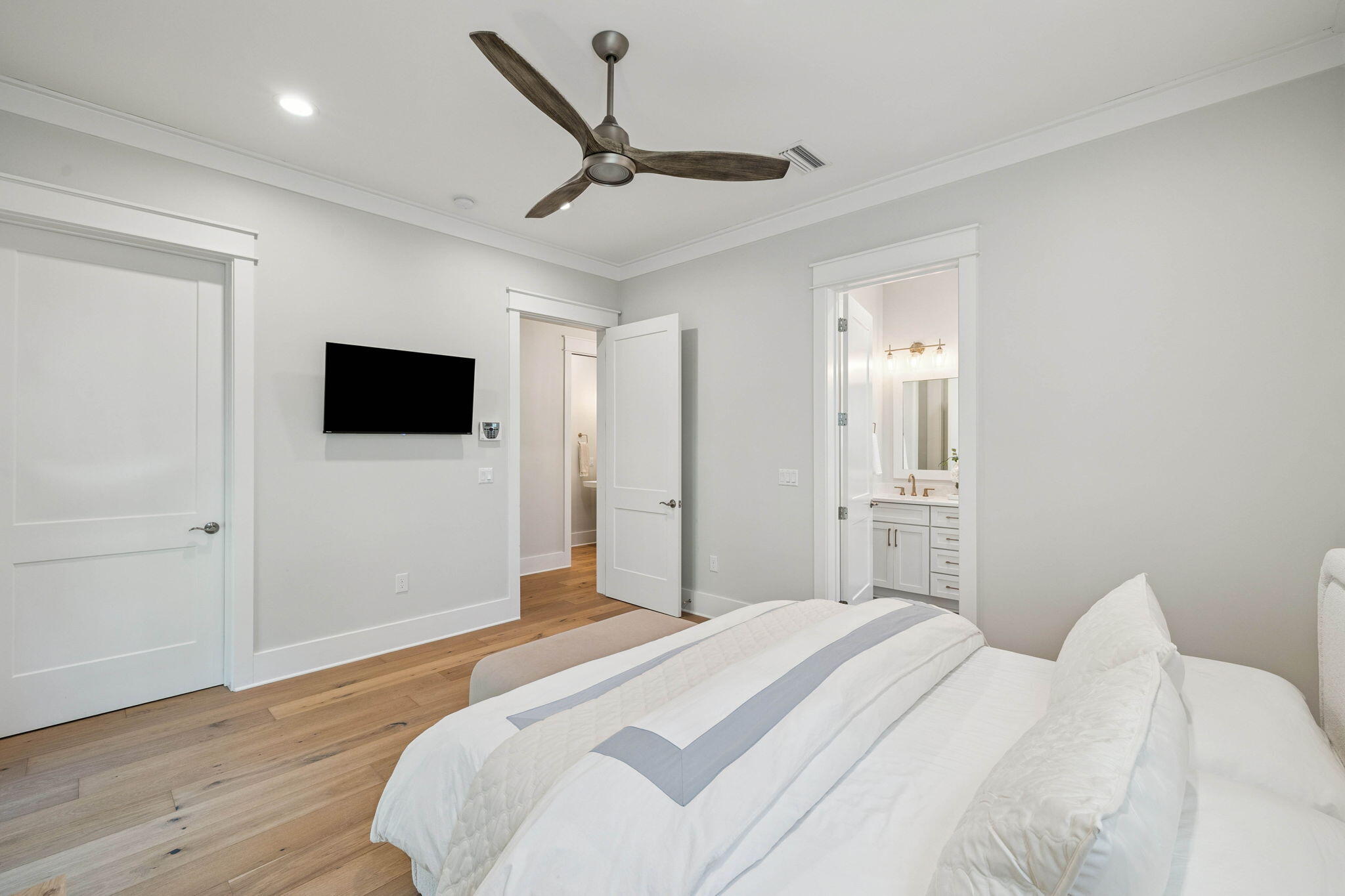 64 White Cottage Road Santa Rosa Beach, FL 32459 - Photo 18 of 35 a bedroom with a bed and a flat screen tv