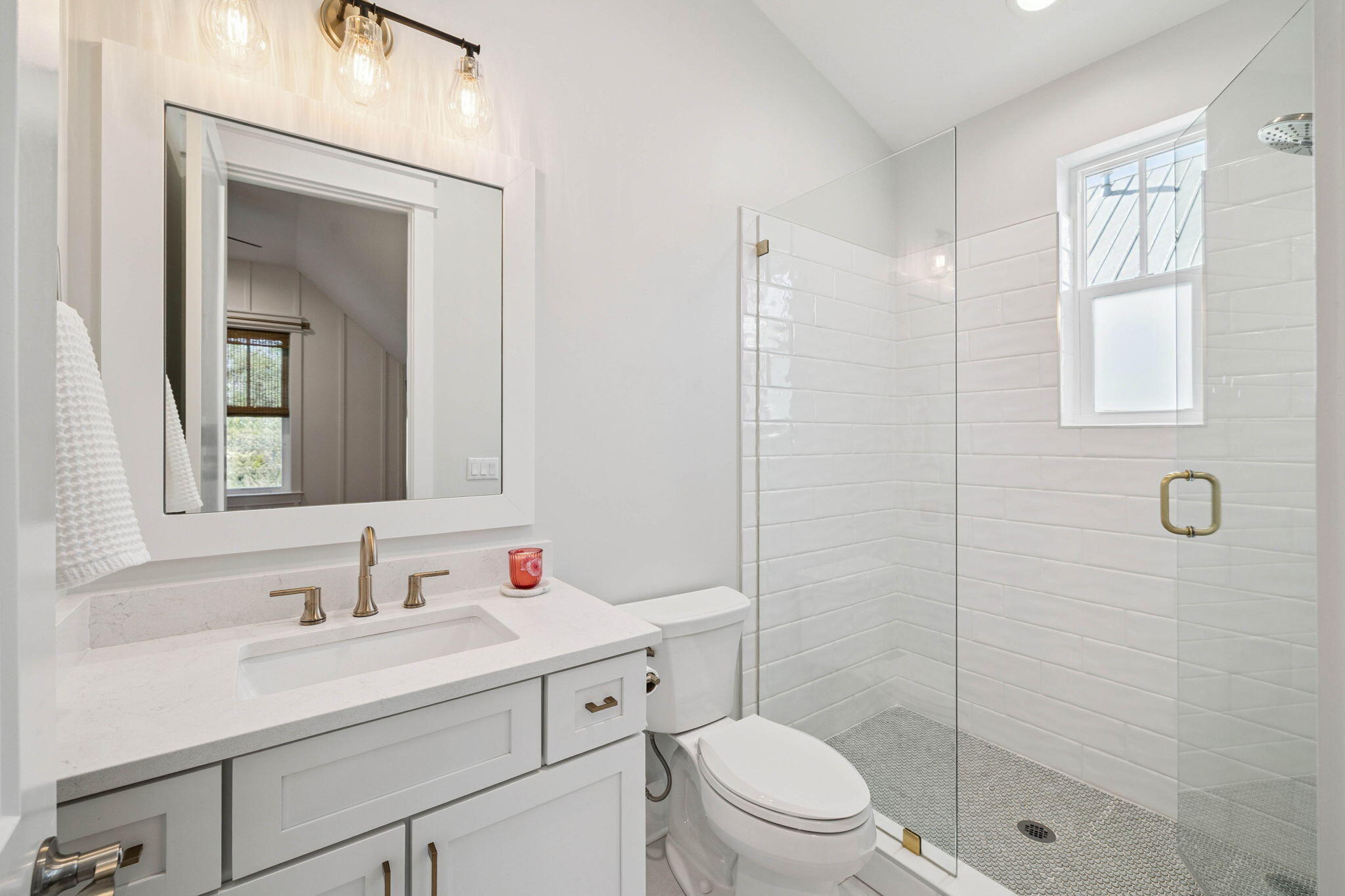 64 White Cottage Road Santa Rosa Beach, FL 32459 - Photo 25 of 35 a bathroom with a sink a toilet and shower