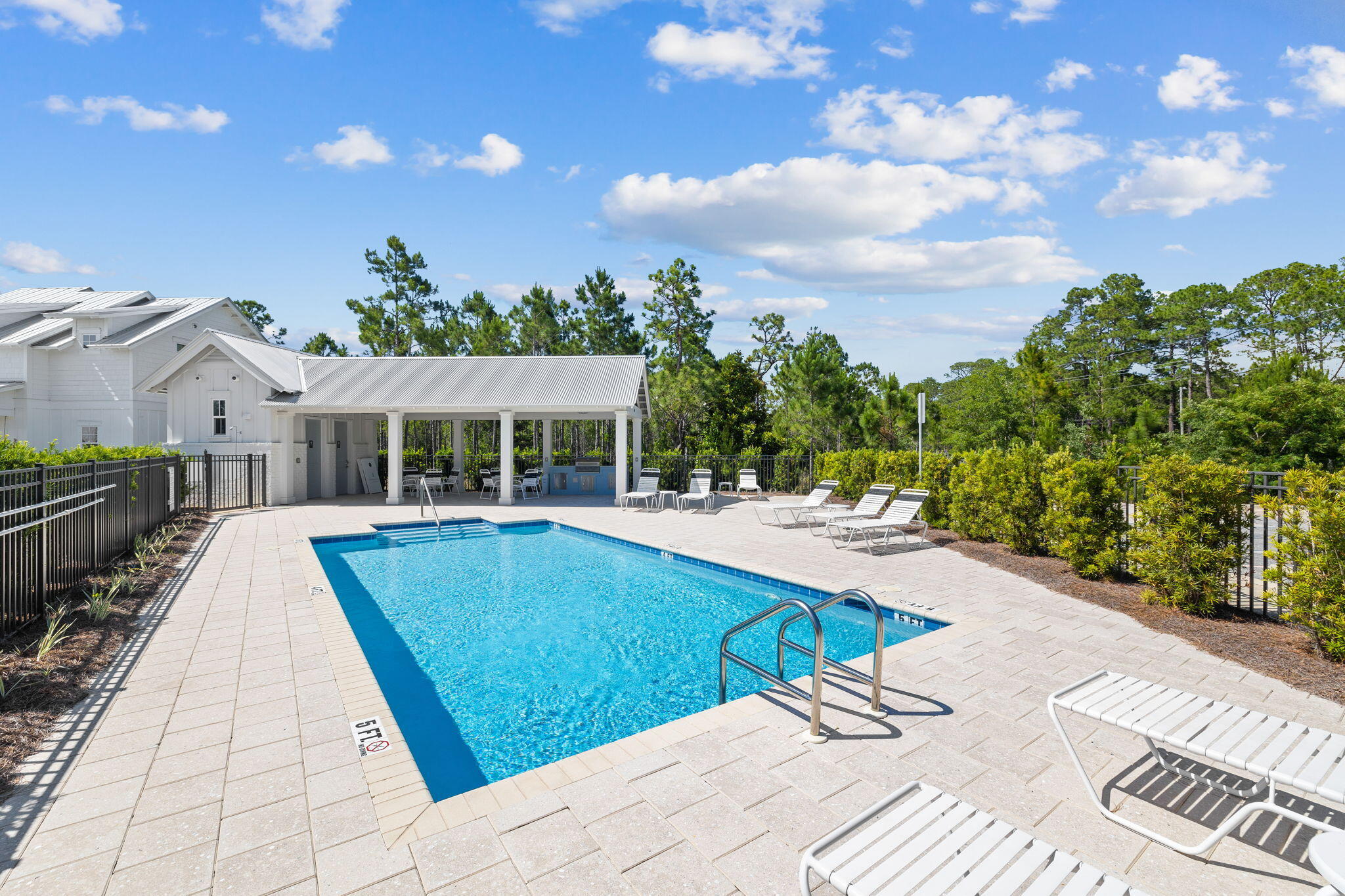 64 White Cottage Road Santa Rosa Beach, FL 32459 - Photo 30 of 35 a view of a house with swimming pool and sitting area