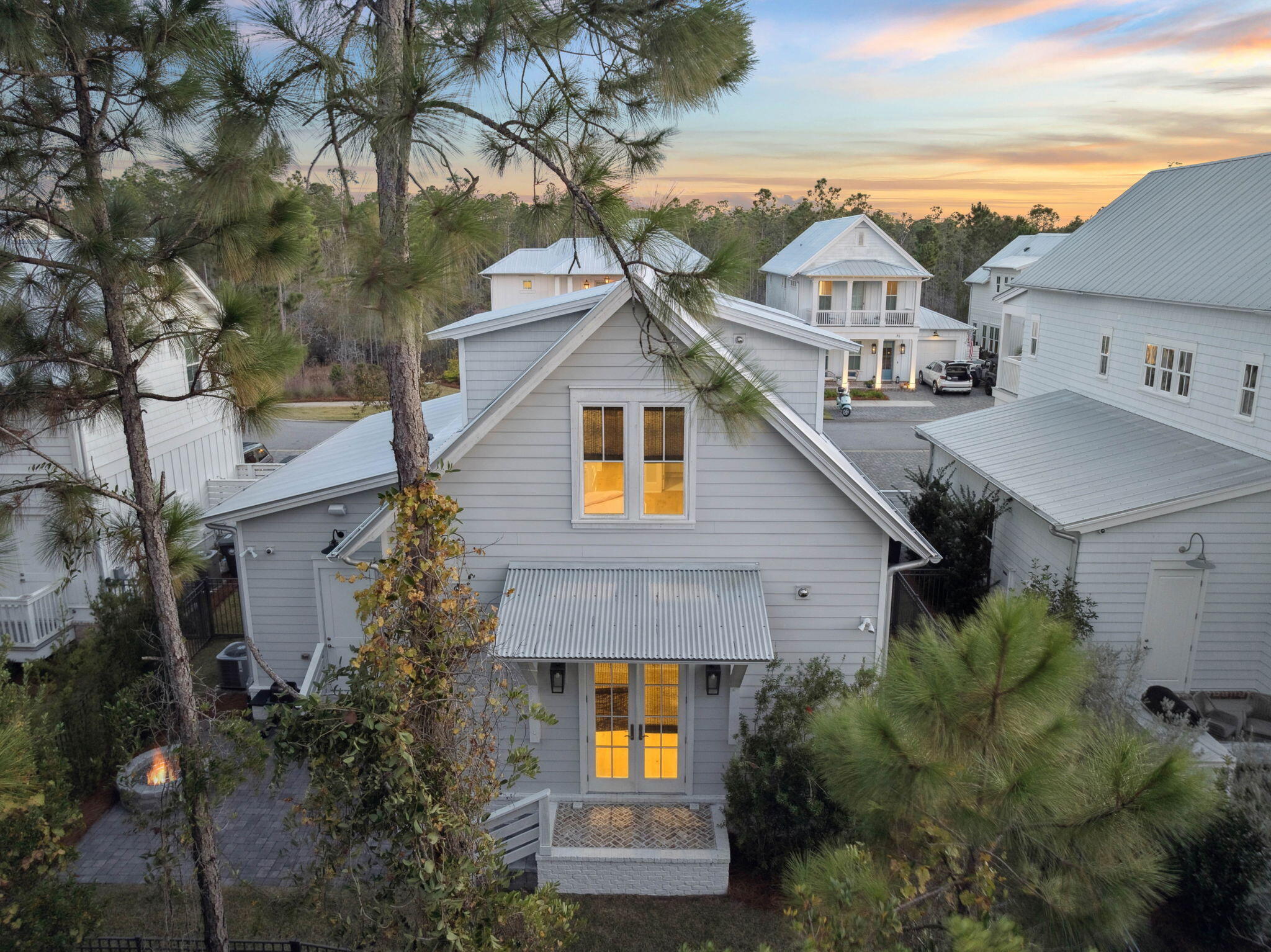 64 White Cottage Road Santa Rosa Beach, FL 32459 - Photo 4 of 35 a front view of a house with trees