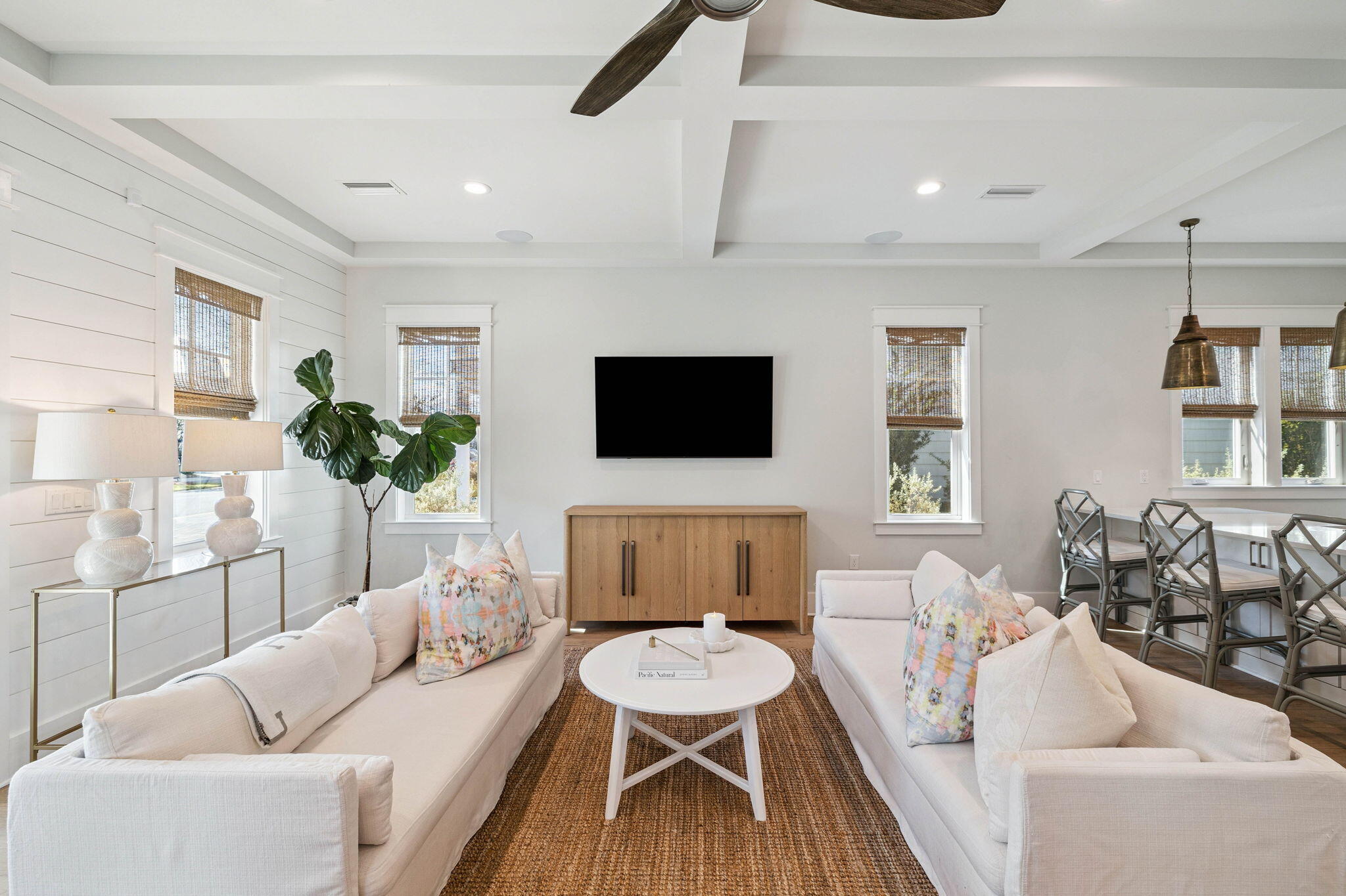 64 White Cottage Road Santa Rosa Beach, FL 32459 - Photo 9 of 35 a living room with furniture and a flat screen tv