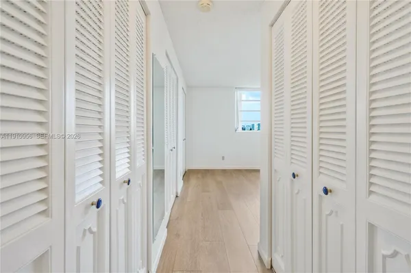 a view of a livingroom with a white door