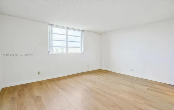 an empty room with a window