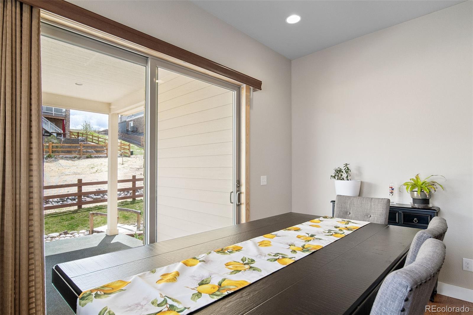 17670 West 94th Drive Arvada, CO 80007 - Photo 17 of 49 a bedroom with a bed and furniture