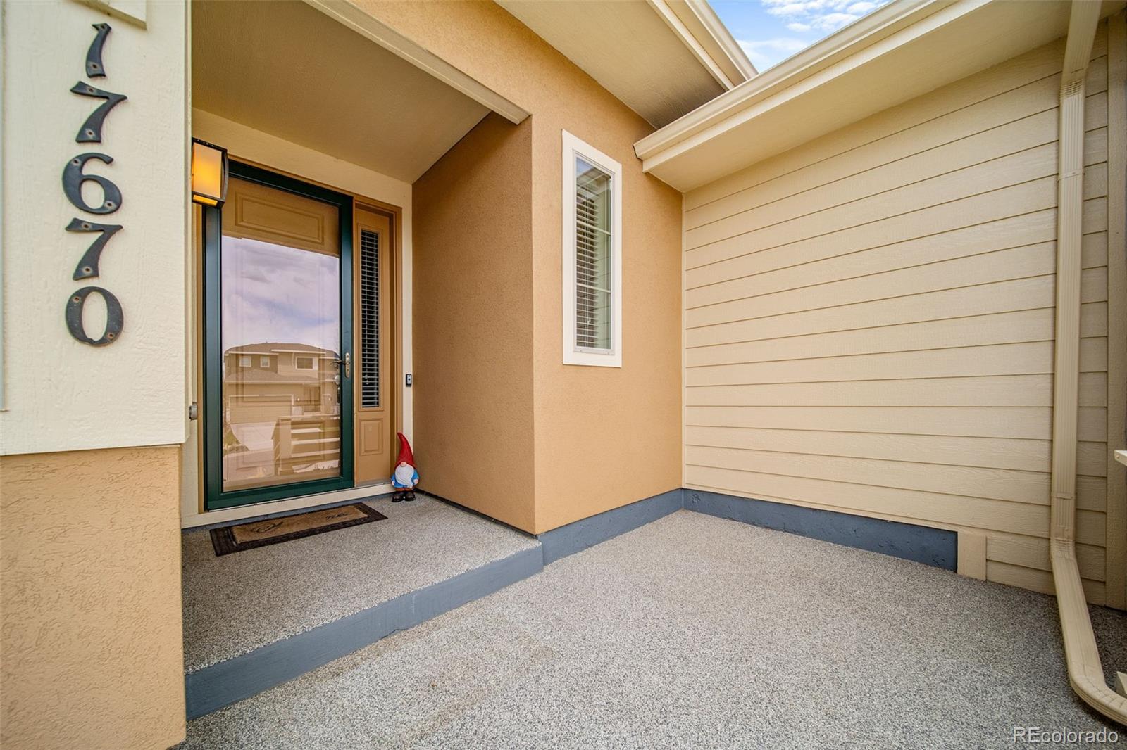 17670 West 94th Drive Arvada, CO 80007 - Photo 49 of 49 a view of an empty room and window
