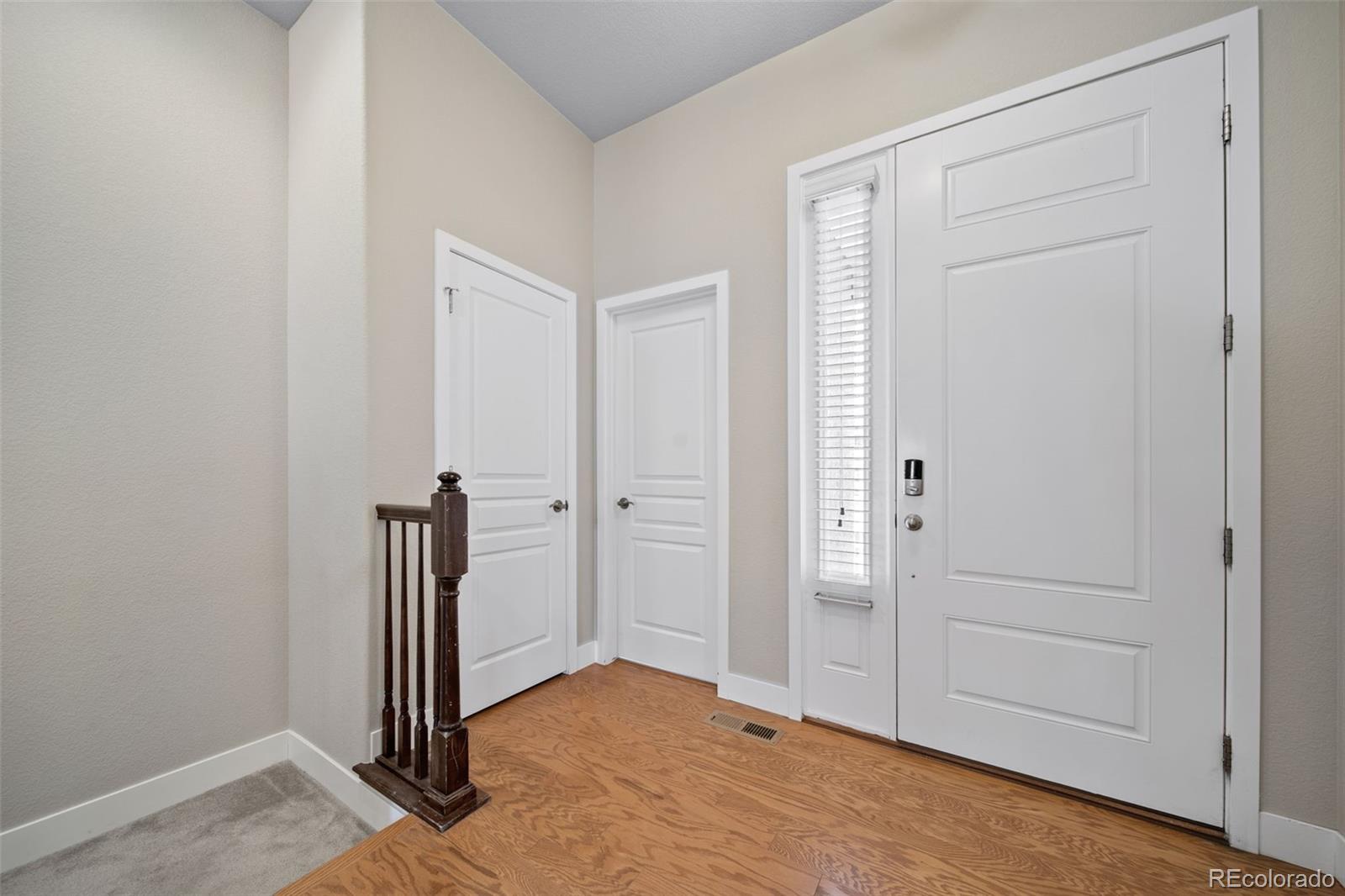 17670 West 94th Drive Arvada, CO 80007 - Photo 5 of 49 an empty room with window