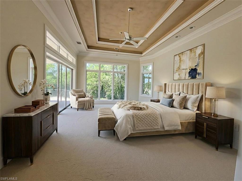1269 Pocantico Lane Naples, FL 34110 - Photo 11 of 45 a spacious bedroom with a bed a mirror and a large window