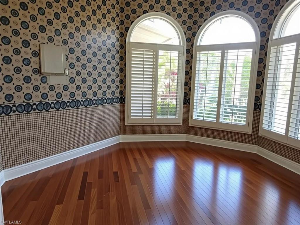 1269 Pocantico Lane Naples, FL 34110 - Photo 16 of 45 a view of a wooden floor with wooden floor