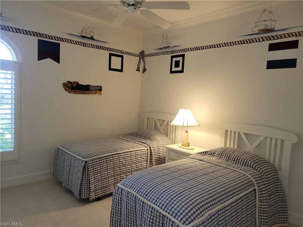 1269 Pocantico Lane Naples, FL 34110 - Photo 27 of 45 a bedroom with two beds and painted walls