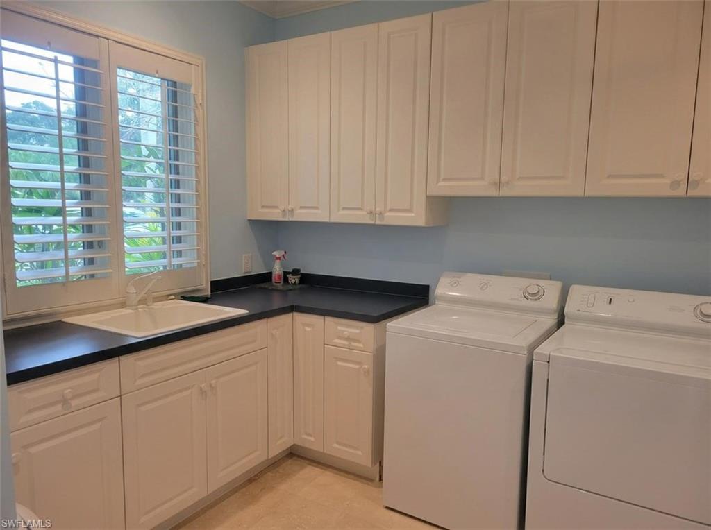1269 Pocantico Lane Naples, FL 34110 - Photo 30 of 45 a utility room with dryer and washer